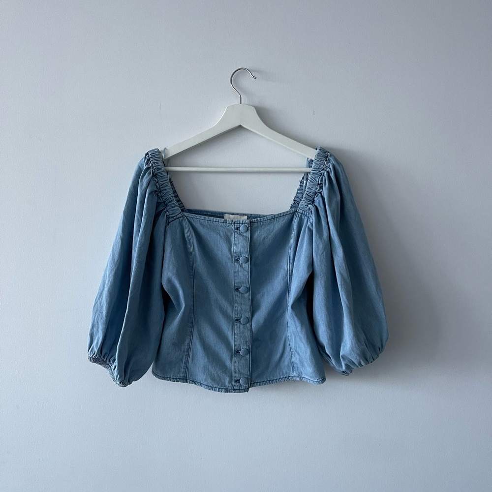 Romantic corset style top with accent sleeves, jeans material